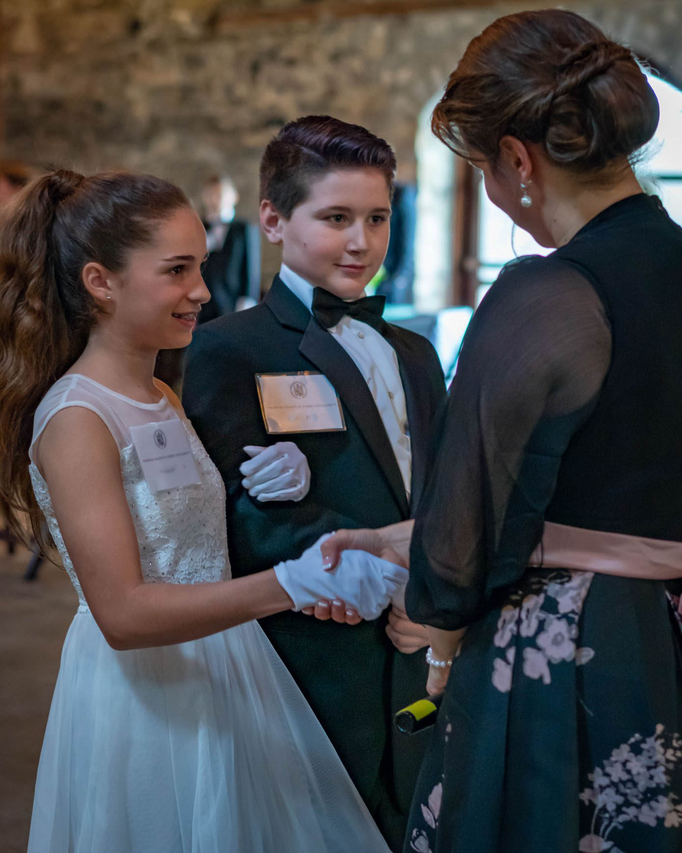 NLJC Director greeting students as they arrive at the Black & White Ball (courtesy of Chandler Slaughter Photography).