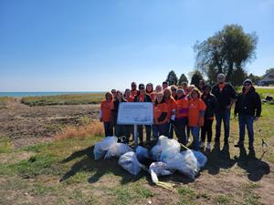 On CU Forward Day, TruStone Financial's Green Bay Road, Wisconsin team volunteered with the Kenosha Parks Department to help plant native plants in Pennoyer Park’s infiltration basin that will improve stormwater quality.