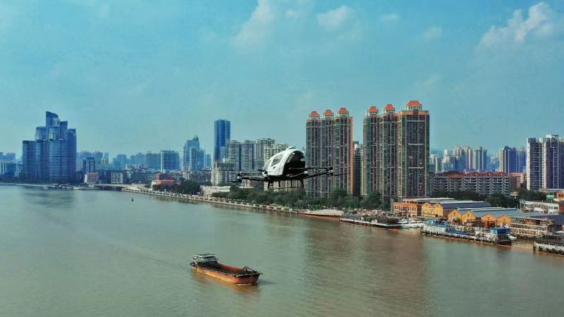 EHang 216 and EHang 216L transporting urgent supplies across the river