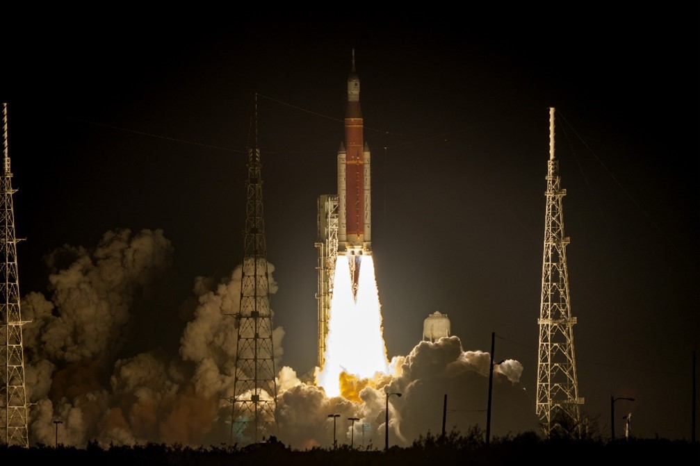 NASA’s Space Launch System rocket, with twin Northrop Grumman solid rocket boosters, lifts off for the first Artemis program launch. Photo Credit: NASA