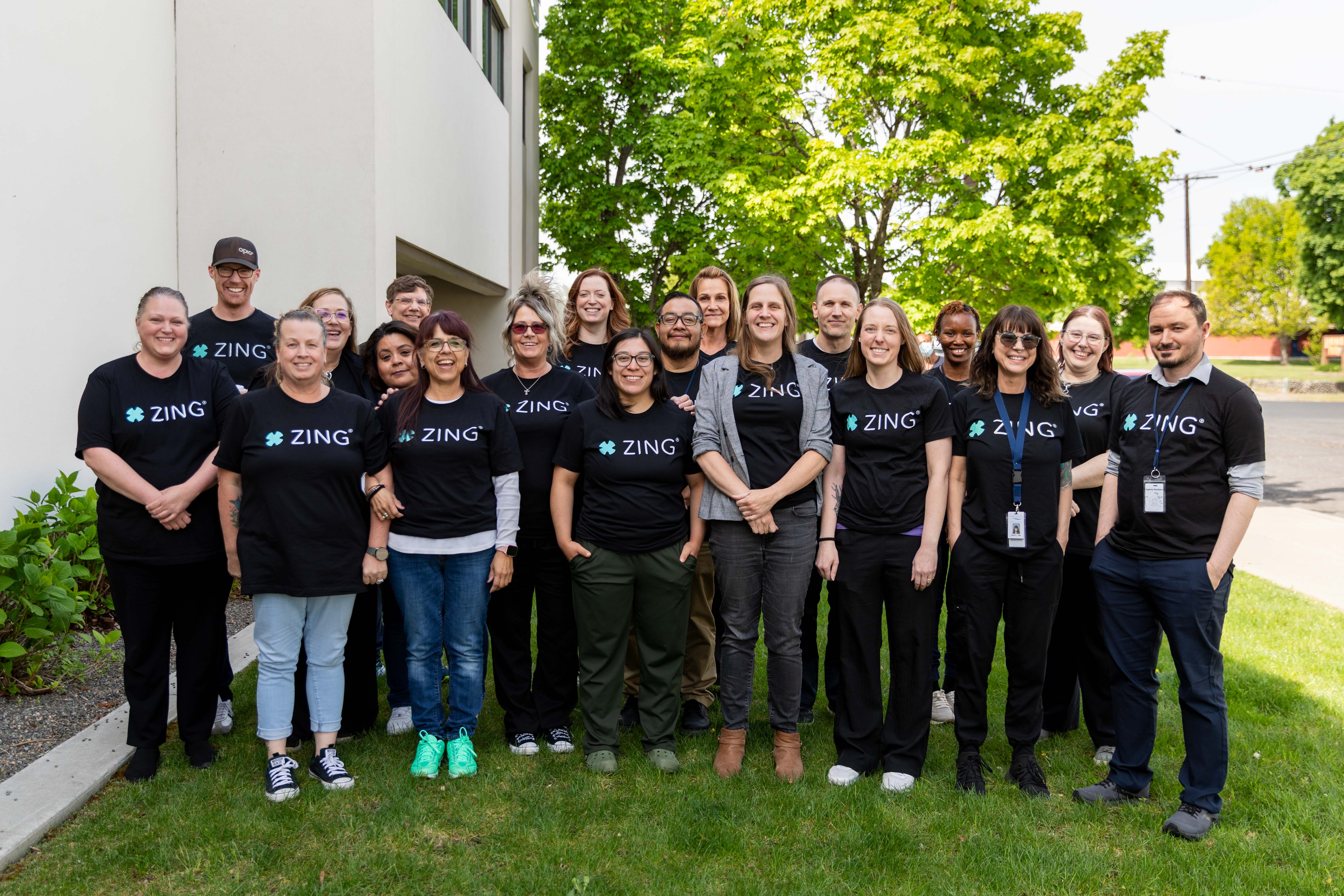 Comprehensive Healthcare Opioid Treatment Program staff celebrate the launch of the ZING robotic methadone dosing system at the Yakima clinic.