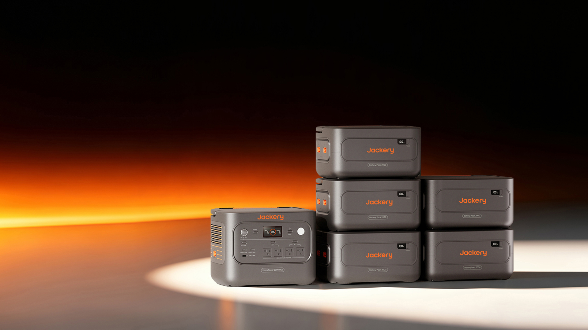Jackery HomePower 2000 Plus v2 power station stacked with expansion batteries