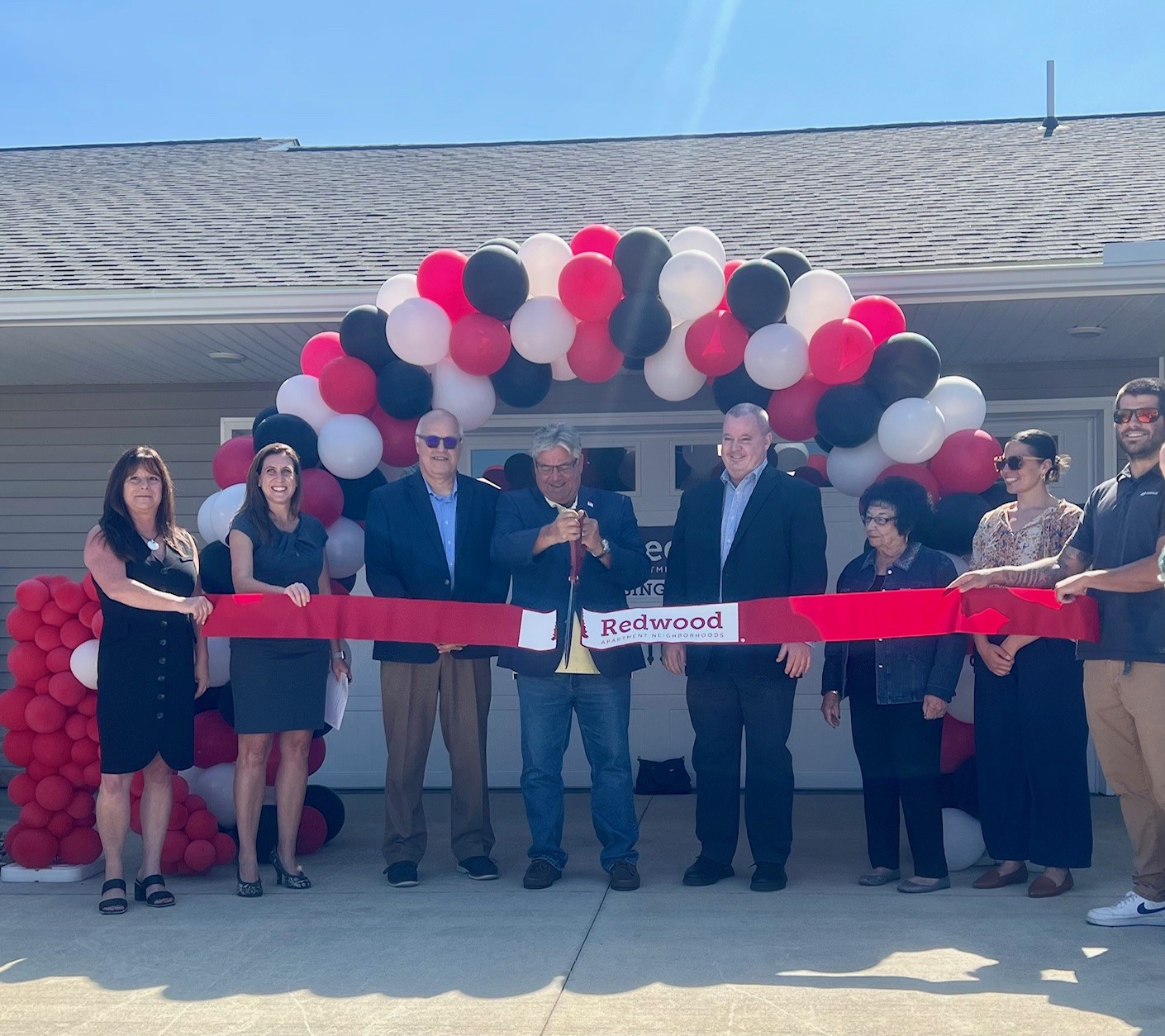 Guests gathered to cut the ceremonial ribbon, take tours and welcome residents to the latest option in rental living in the Sandusky area.