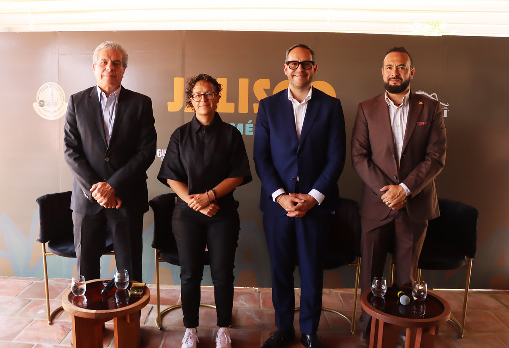 The Secretary of Tourism for Jalisco stands with Concours Mondial de Bruxelles Organizers
