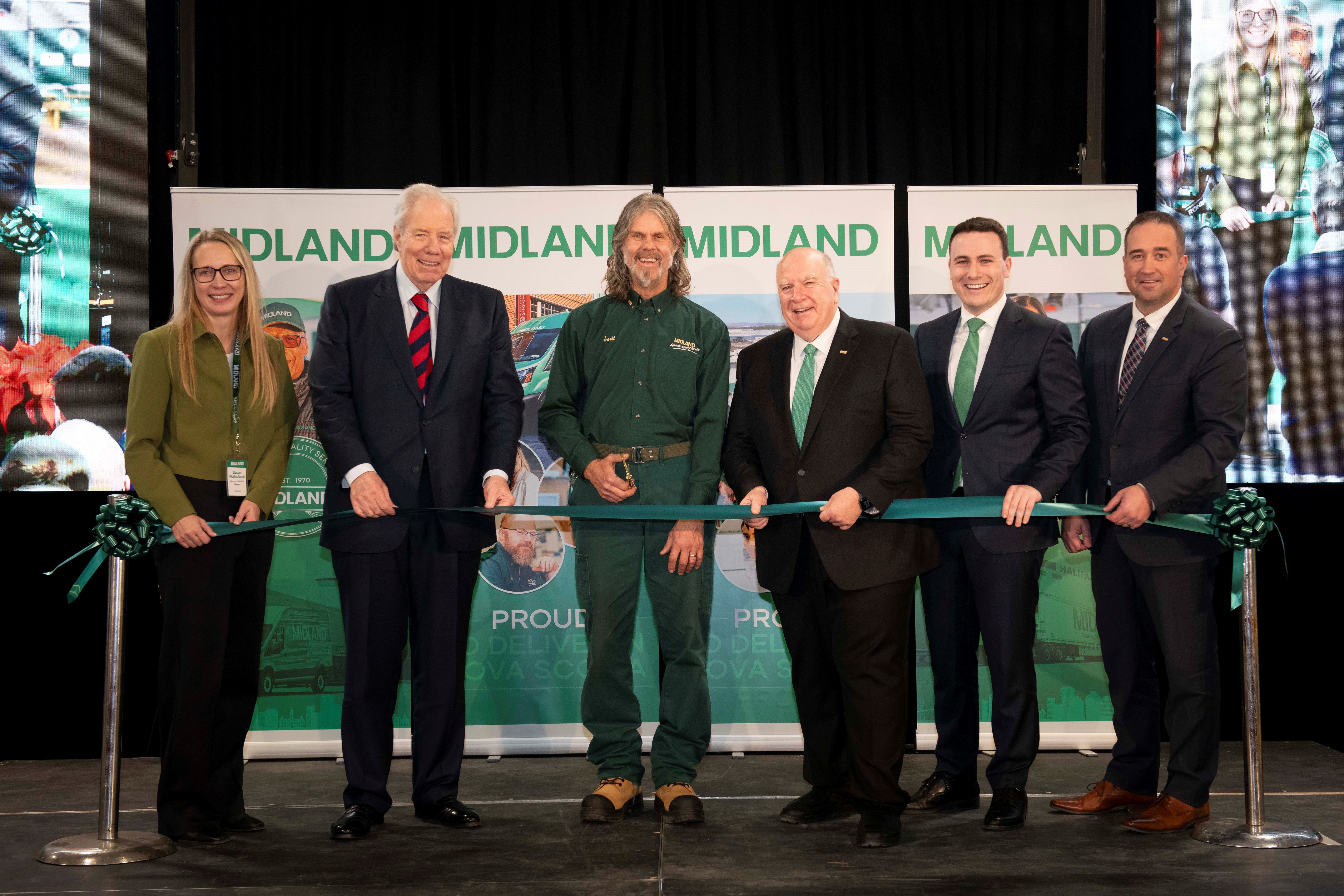 Susan Mulholland, Dartmouth Terminal Manager; Jim Irving, Co-Ceo, J.D. Irving, Limited; Scott Naugler, Midland employee for over 40 years and a Million Mile driver; Robert Irving, President of Midland and Co-CEO of J.D Irving, Limited; RJ Irving, Senior Vice President and General Manager; and Rob Sangster, Vice President of Operations.