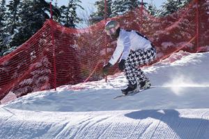 Nick Baumgartner, a U.S. Snowboard Cross athlete and Olympic Gold Medalist, trains at Waterville Valley Resort