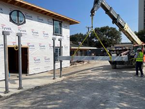 Beam Placement at Audie Murphy VA Fisher House Topping Off Ceremony