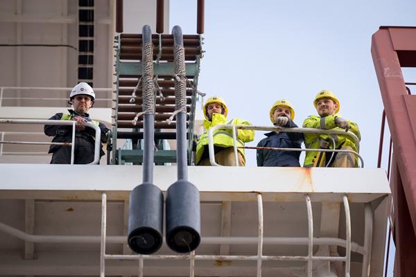 The crew aboard the MSC Meline prepare to connect to GCT Deltaport Shore Power Grid. 