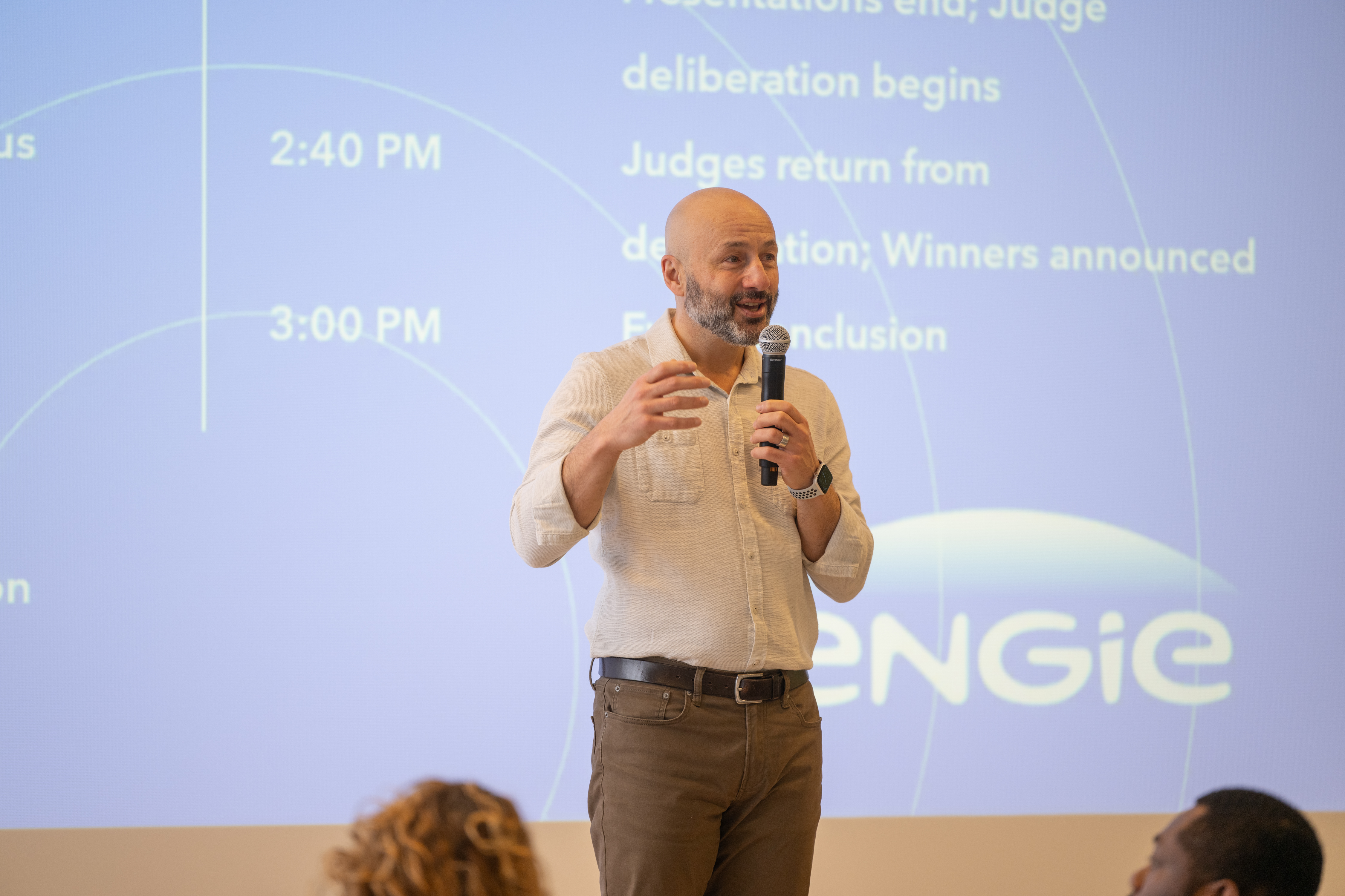 ENGIE Vice President of Major Partnerships Serdar Tufekci welcomes participants, judges, and spectators to the 2024 Smart Campus Challenge Judging Event at the newly built Energy Advancement and Innovation Center.