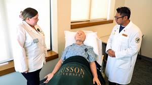 Students from Husson University interact with the new HAL S5301 interdisciplinary patient simulator in the Simulation Education Center. HAL will be used by students in healthcare programs including nursing, physical therapy, occupational therapy and pharmacy.