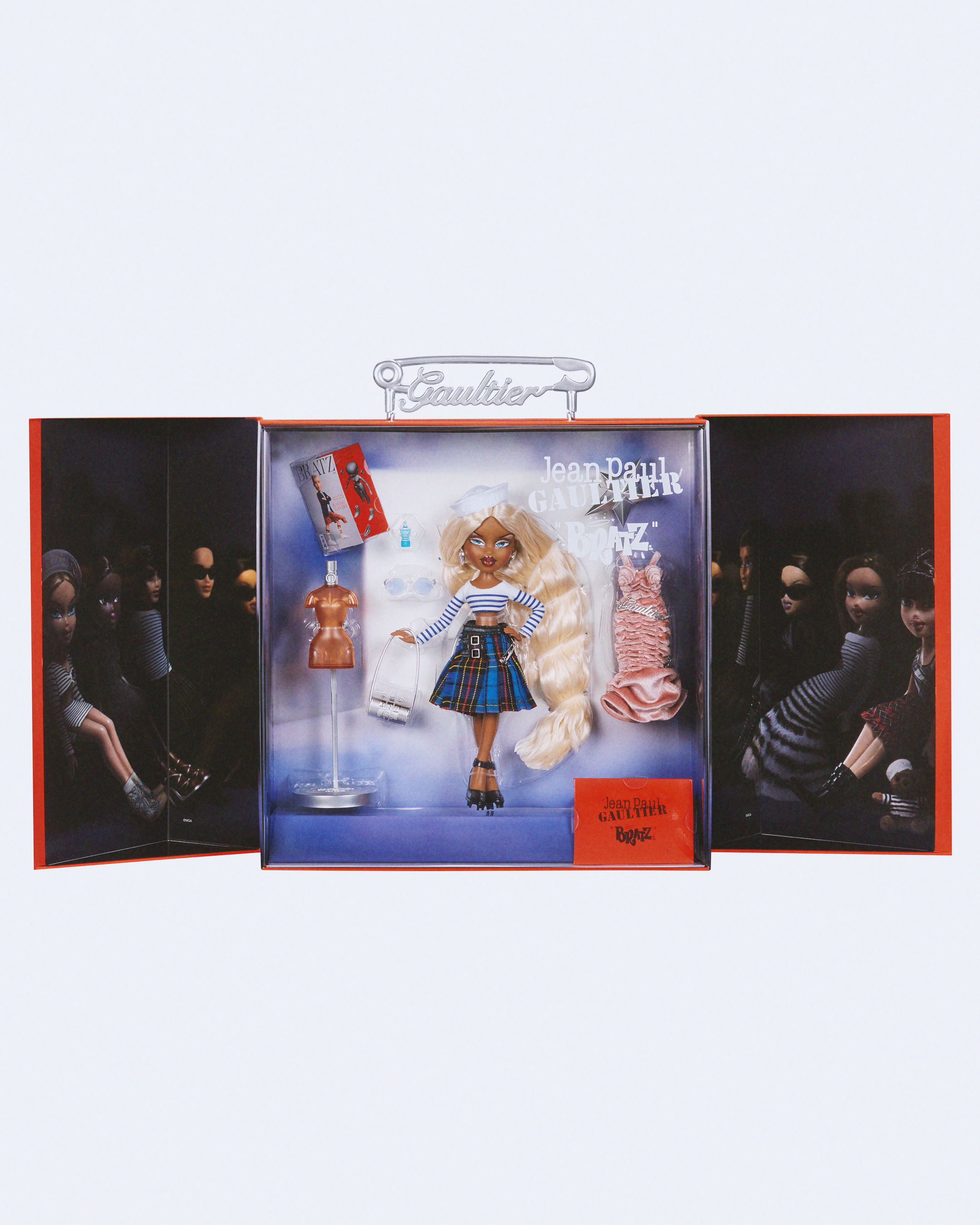 A standout luxury collectible, the The Bratz x Jean Paul Gaultier Collector Doll includes two outfits, fun accessories – like a mini Bratz x Gaultier fashion magazine and Gaultier fragrance bottle – along with custom packaging featuring a branded “Gaultier” safety pin handle and a surprise fold-out display.