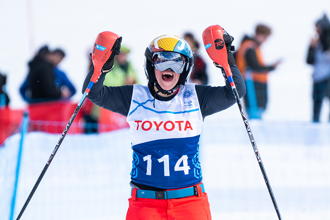 Clemence Samaille celebrates as he crosses the finish line, securing silver in the advanced giant slalom F04 final at the Special Olympics World Winter Games Turin 2025. This was the only medal won by the Special Olympics France alpine skier at the event.Photo by: Pablo Dondero