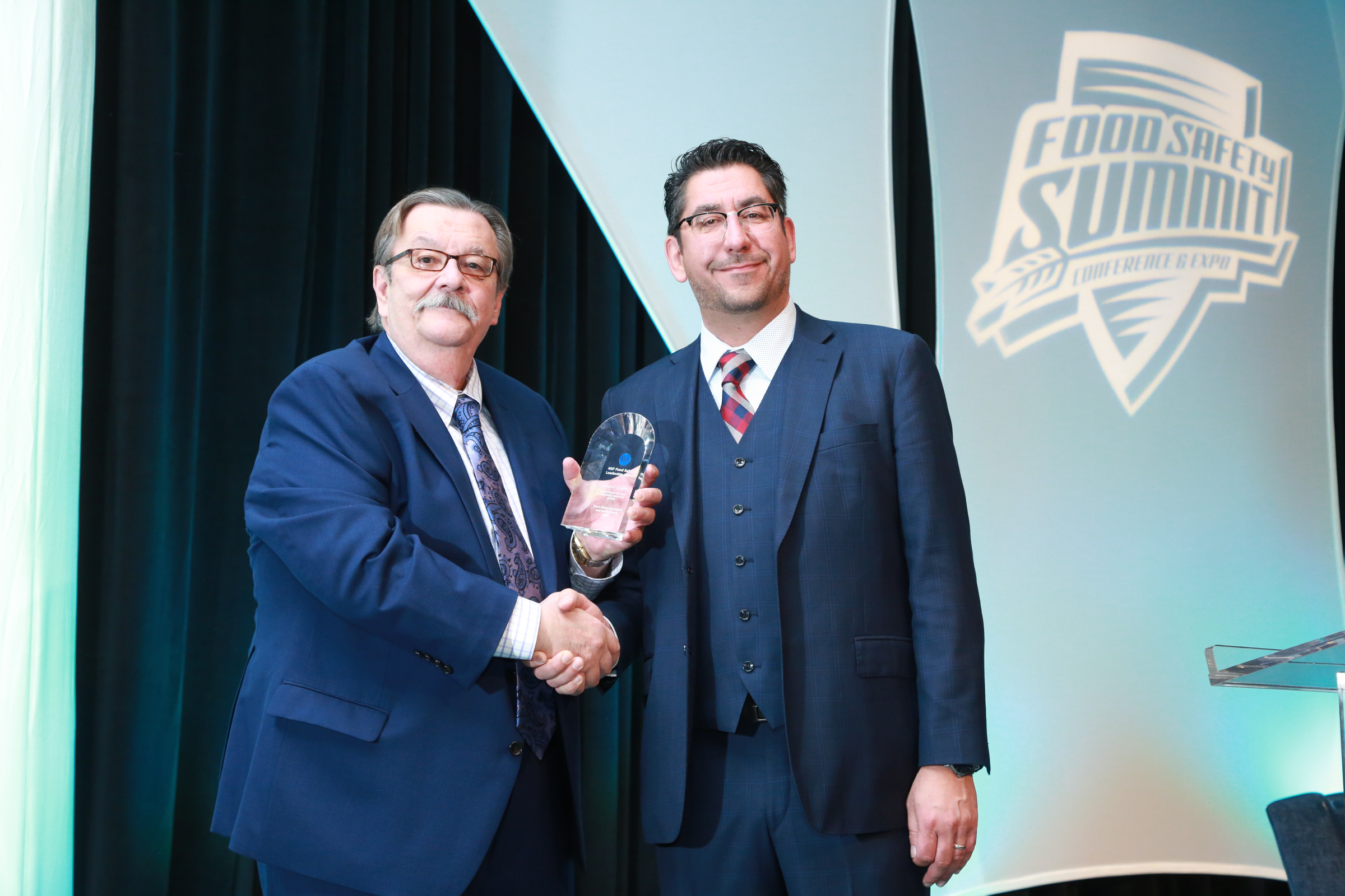 Pictured: Joe Corby (left) and Robert Prevendar (right), Global Managing Director, Supply Chain Food Safety at NSF International.