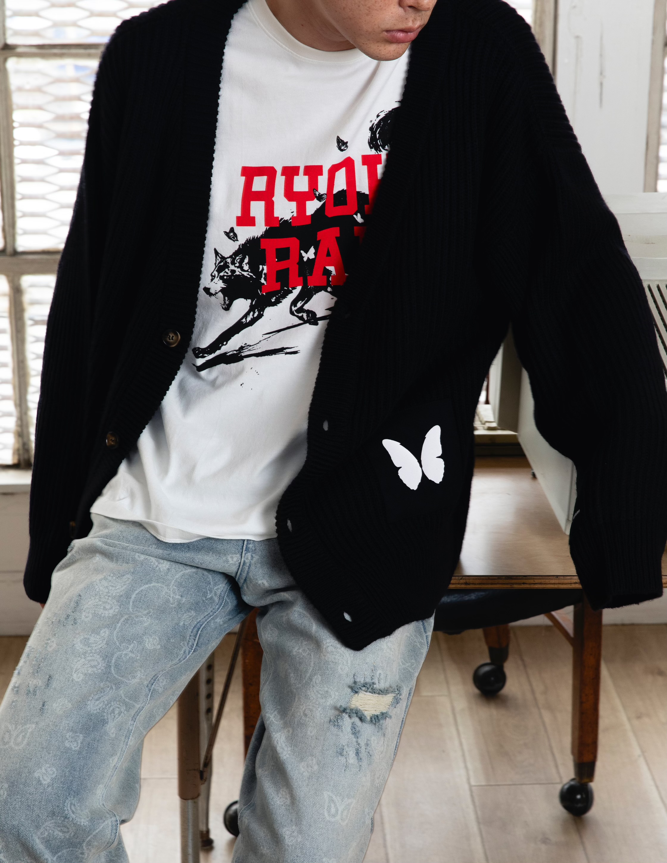 A model showcases standout pieces from Ryoko Rain’s 2024 Fall/Winter Collection, embodying the brand’s deep-rooted cultural and design narrative.