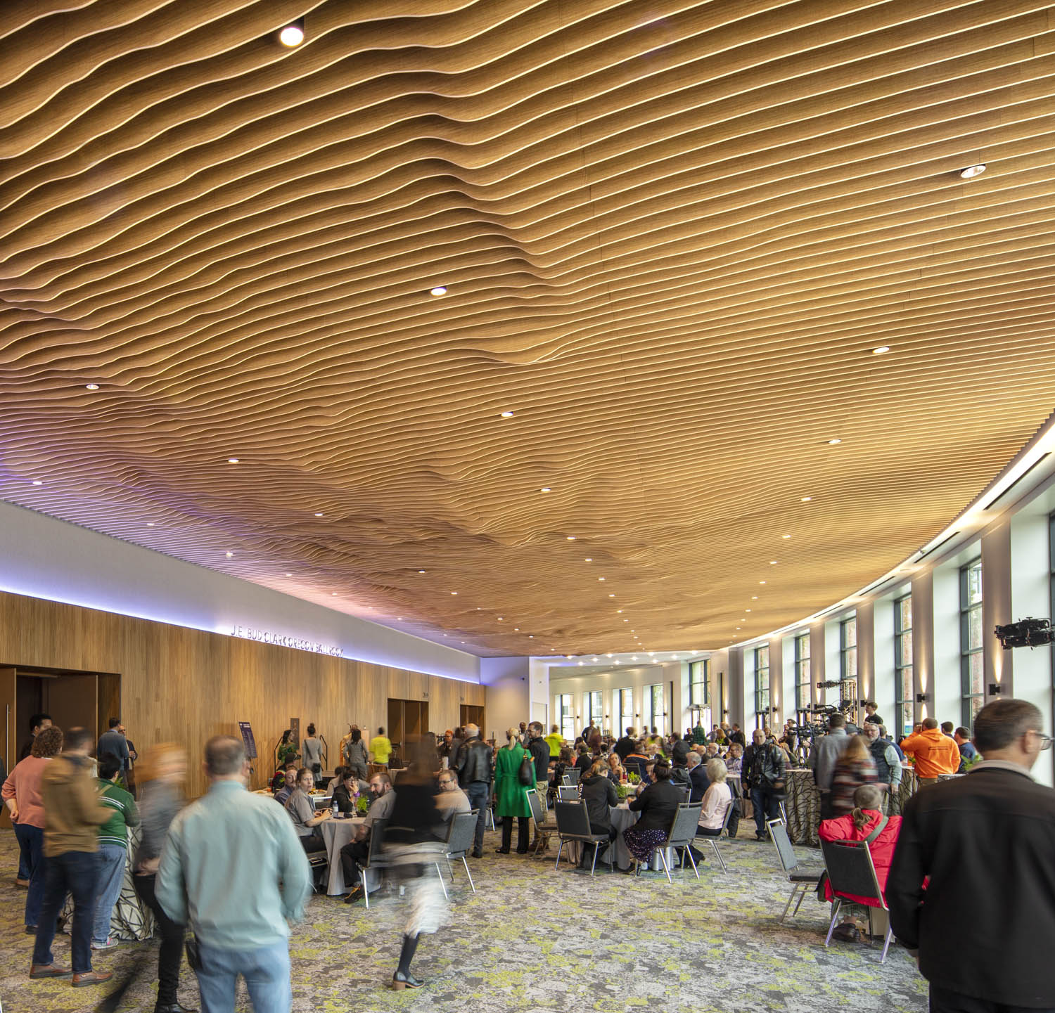 The prefunction ceiling is a custom fabricated topography of the Cascade Range, spanning from Mt. Hood to Crater Lake. Image copyright Adam Hunter/LMN Architects.