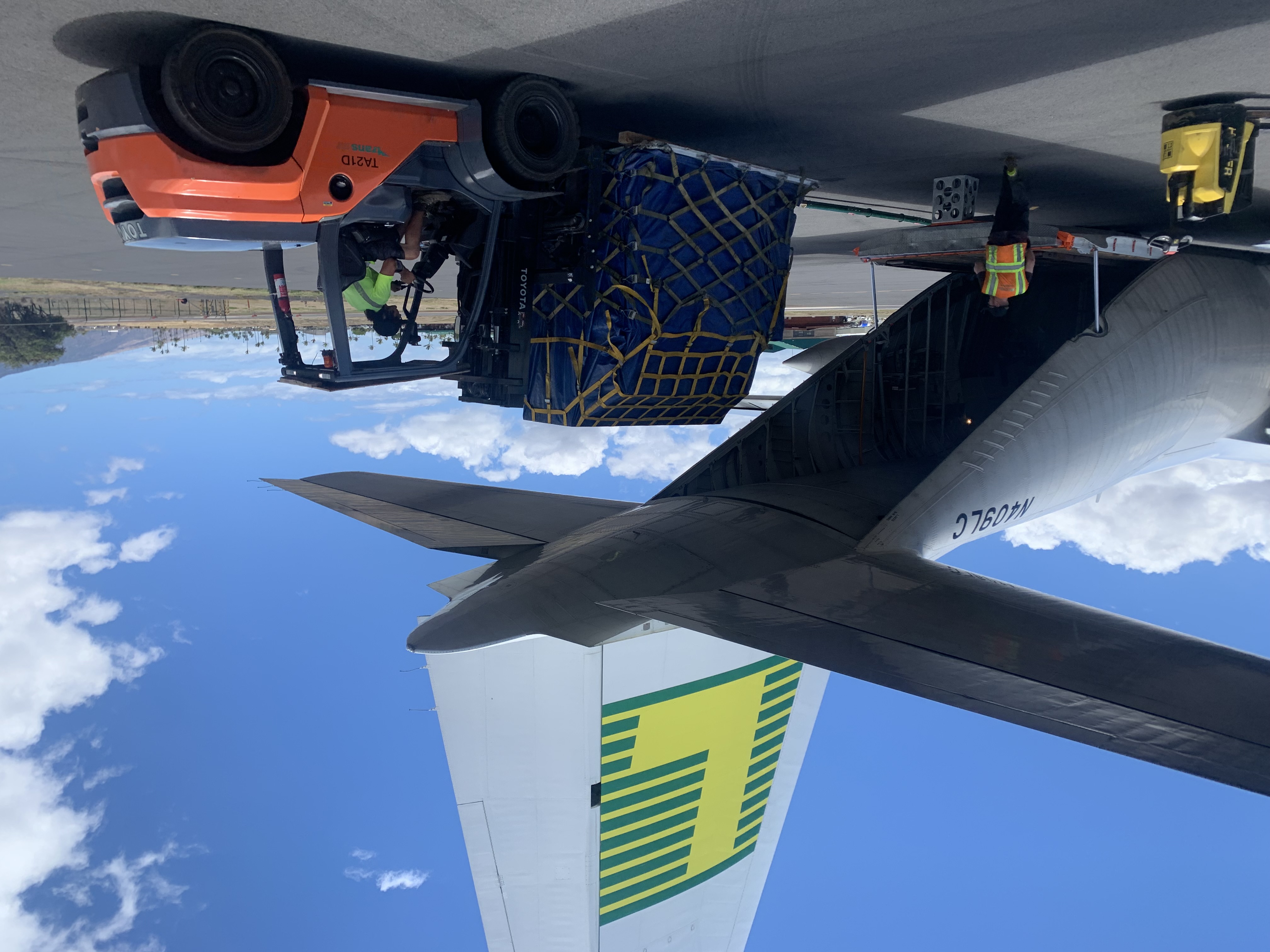 Maui relief supplies being unloaded from Lynden's Hercules aircraft 