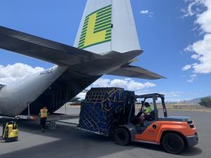 Maui relief supplies being unloaded from Lynden's Hercules aircraft 