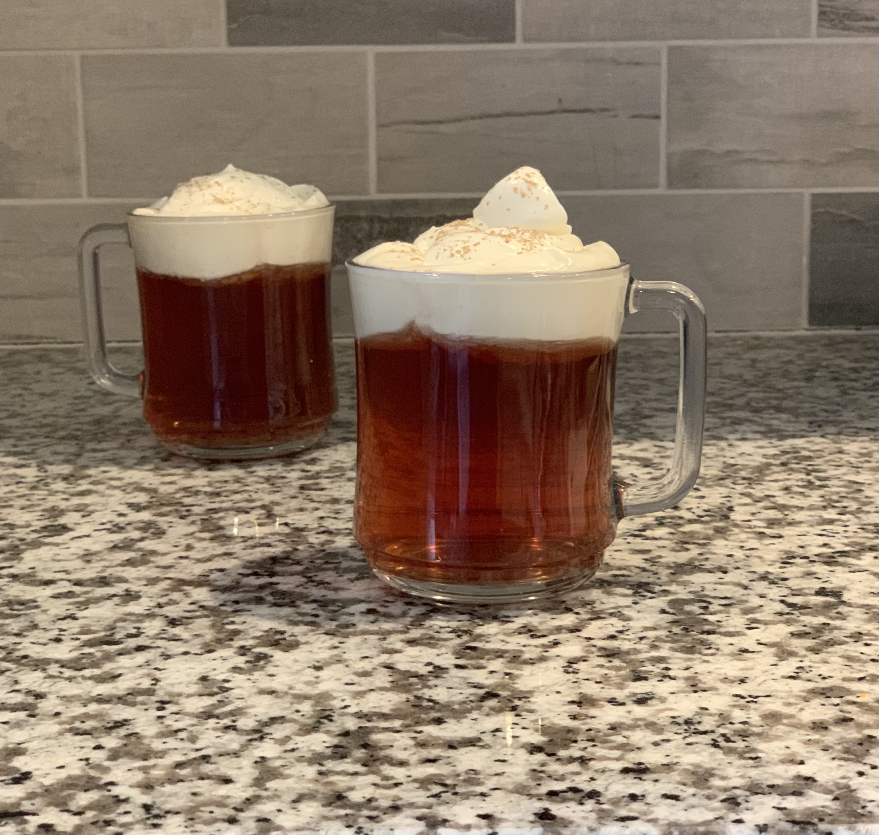 Cheese Foam Tea is a new tea drink that originated in Asia and is quickly gaining popularity worldwide. It consists of green or black tea that's topped with a sweet and salty cream cheese foam. The French made Duralex Empilable glass mug is designed to show off the complexity of this trending beverage.