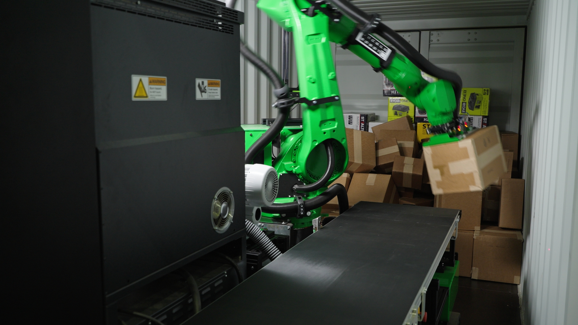 Pickle Robot Unloading Boxes from a Messy Trailer