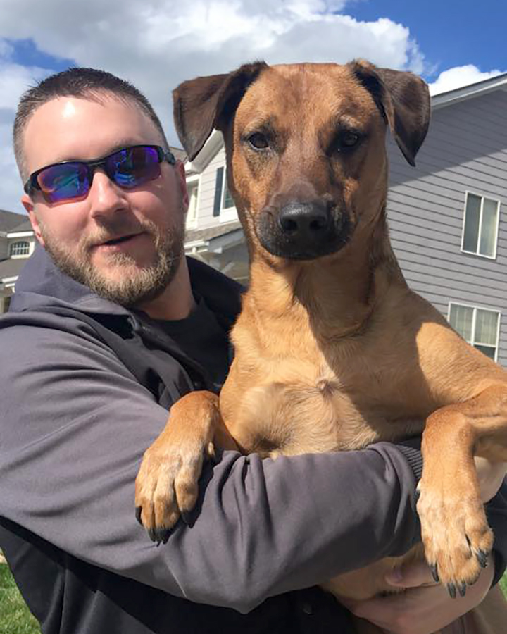 Canvas Consultant Todd Hill enjoying some blue Colorado skies in Castle Rock with his sweet pup Shooter. (Photo courtesy Todd Hill)