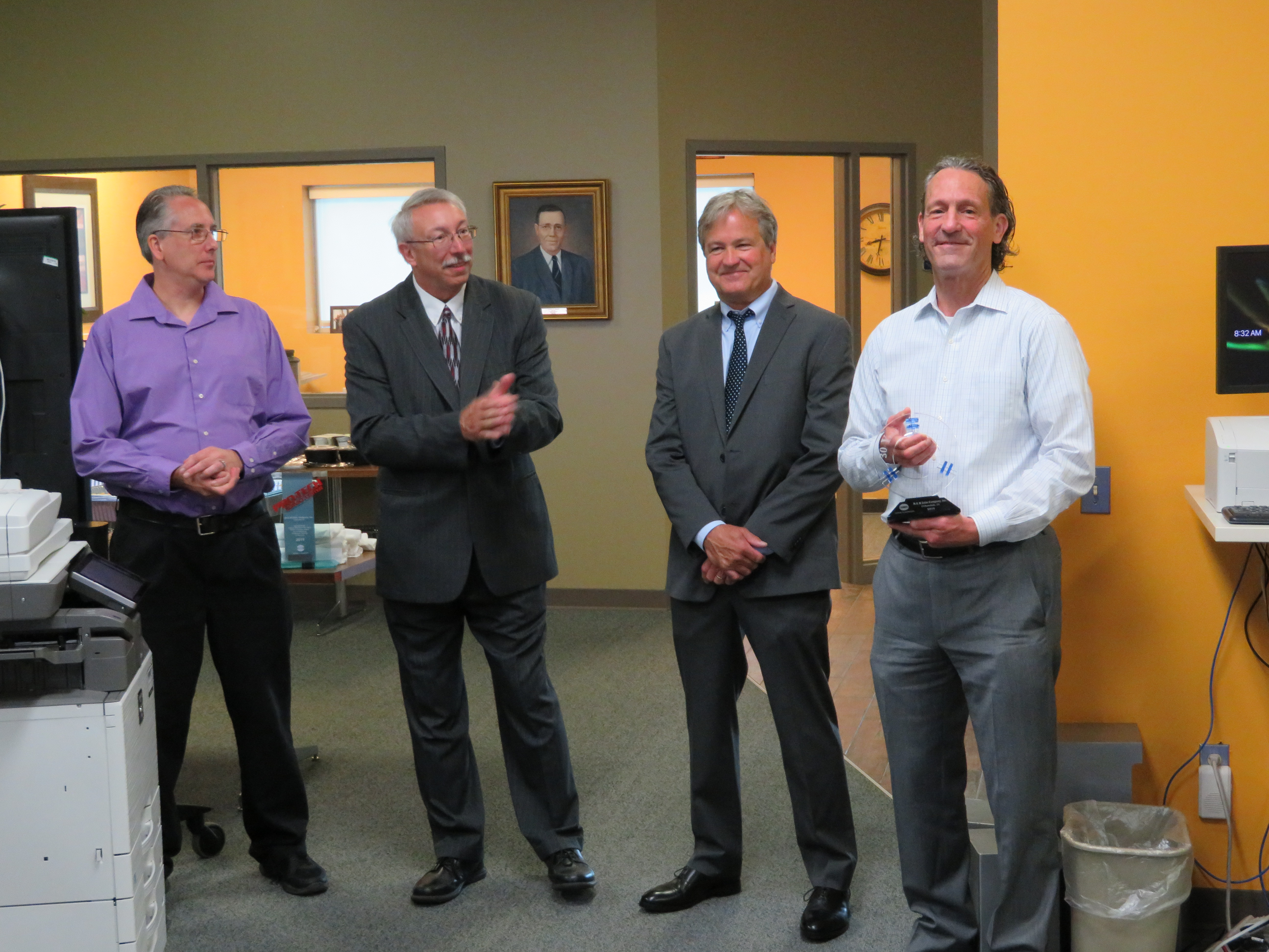 September 18, 2019 – Urbandale, IA – MMIT Business Solutions (MMIT) was presented with a special Konica Minolta Pro-Tech Service Award as recognition for 30 consecutive years earning Pro-Tech certification.  (L-R) John Skow, Technical Services Manager, MMIT; James Boyic, Regional Service Manager, Konica Minolta; Kevin Streuli, Director, Field & Systems Support, Konica Minolta; Tom Minor, President, MMIT