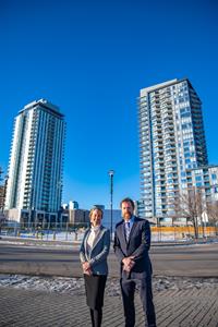 Kate Thompson, CMLC’s President and CEO, with Thomas Burr, ONE Properties’ Vice President of Mixed-Use Development - Western Canada, at the future site of ONE’s new towers in East Village.