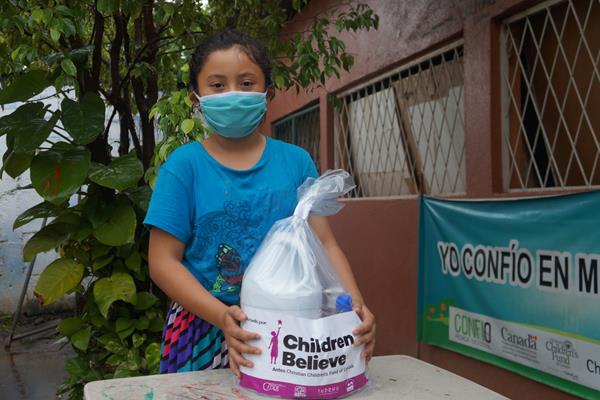Through Children Believe, this youth in Nicaragua received a hygiene kit and information to help her family avoid spread of COVID-19. 