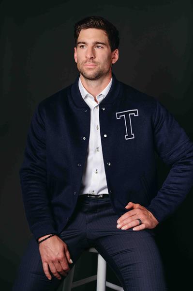 John Tavares wears the SENTALER x John Tavares Varsity Jacket