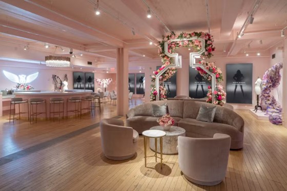 Samsung QM85C and QM98C displays showing “The Tour ’23” campaign visuals alongside designer fashion pieces. Photo: Adrian Wilson / Courtesy of Victoria’s Secret