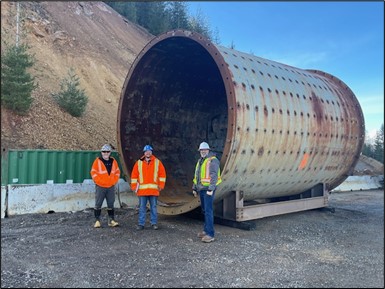 Bunker Hill team member showing the Golden Sunlight Rod Mill to visiting engineers from Ausenco