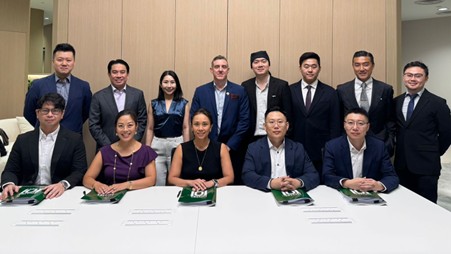 In photo during the signing of the binding definitive agreement today August 20, 2025 at Hotel101 Global Corporate Office in Singapore