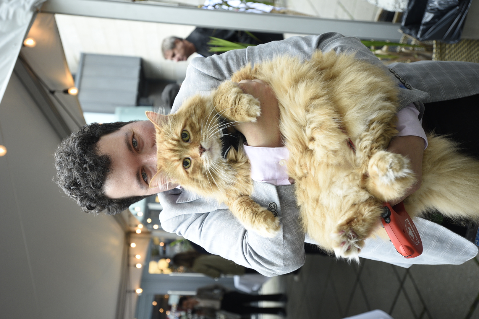 David Burkholder with his cat Justin, a finalist in the Cutest Cat category