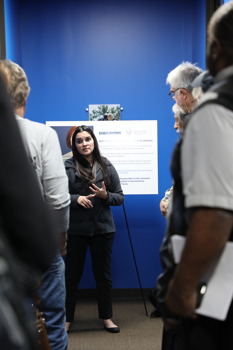 Veteran Supportive Services Program Director, Melissa Escamilla gives the community a tour of the new office and services they provide. 