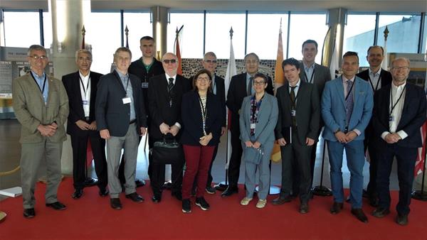 Canadian delegation (representing OCNI, ATS Automation, OPG, Rolls Royce, MDA, Canadian Nuclear Laboratories, Tyne Engineering, Laker Energy Products, SNC-Lavalin, Promation Nuclear and UNENE) with Trade Commissioner Denis Trottier (fifth from the left) greeted by ITER Director General Dr. Bernard Bigot (back row third from the right) 