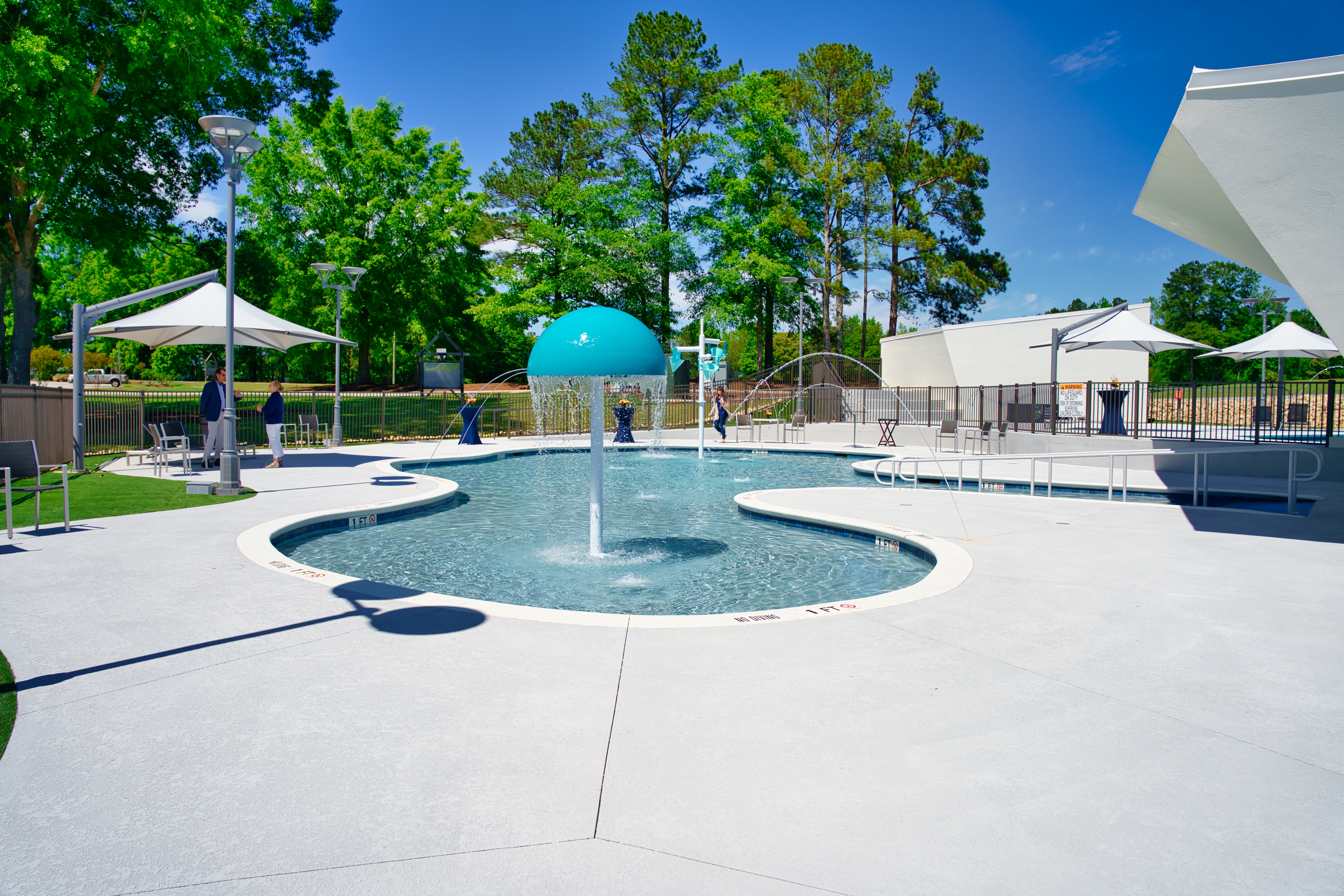 Summer campers and veterans alike will enjoy the beauty and tranquility of the Aquatics Center's spacious deck and zero-entry pools. 