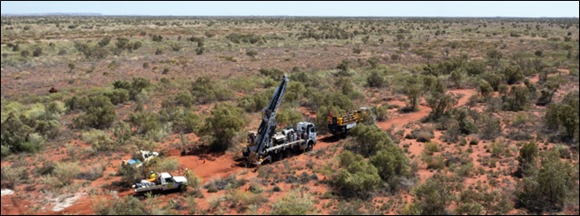 Drilling at the Heckmair Prospect in April 2023, showing the flat topography in open sand covered plains