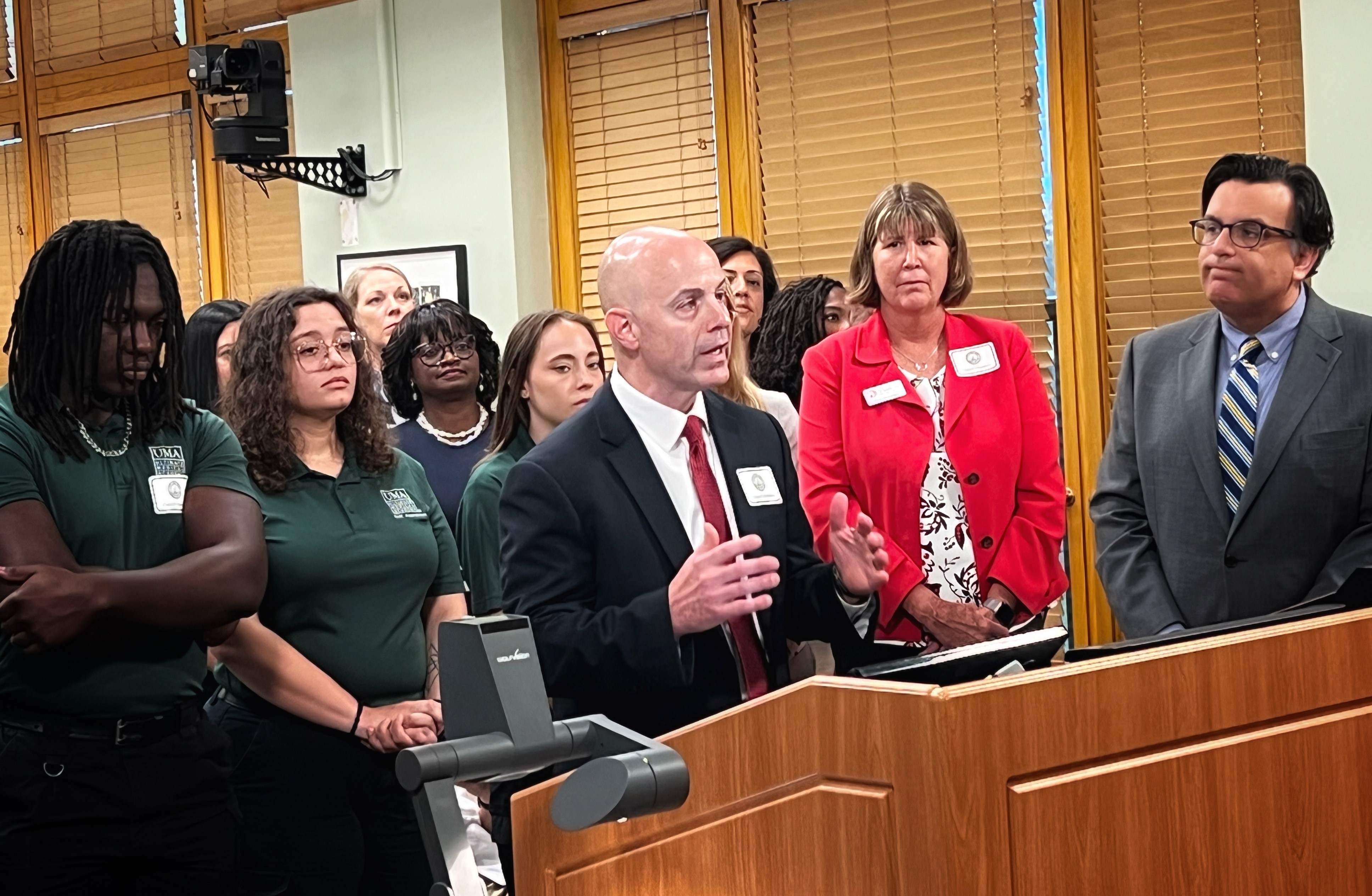 UMA President Thomas Rametta thanks the Tampa City Council for their recognition of Ultimate Medical Academy's 30 years of equipping and empowering learners to excel in healthcare careers. He's joined by recent graduates, team members, faculty and partners from the Crisis Center of Tampa Bay who are among the organizations employing UMA's graduates.