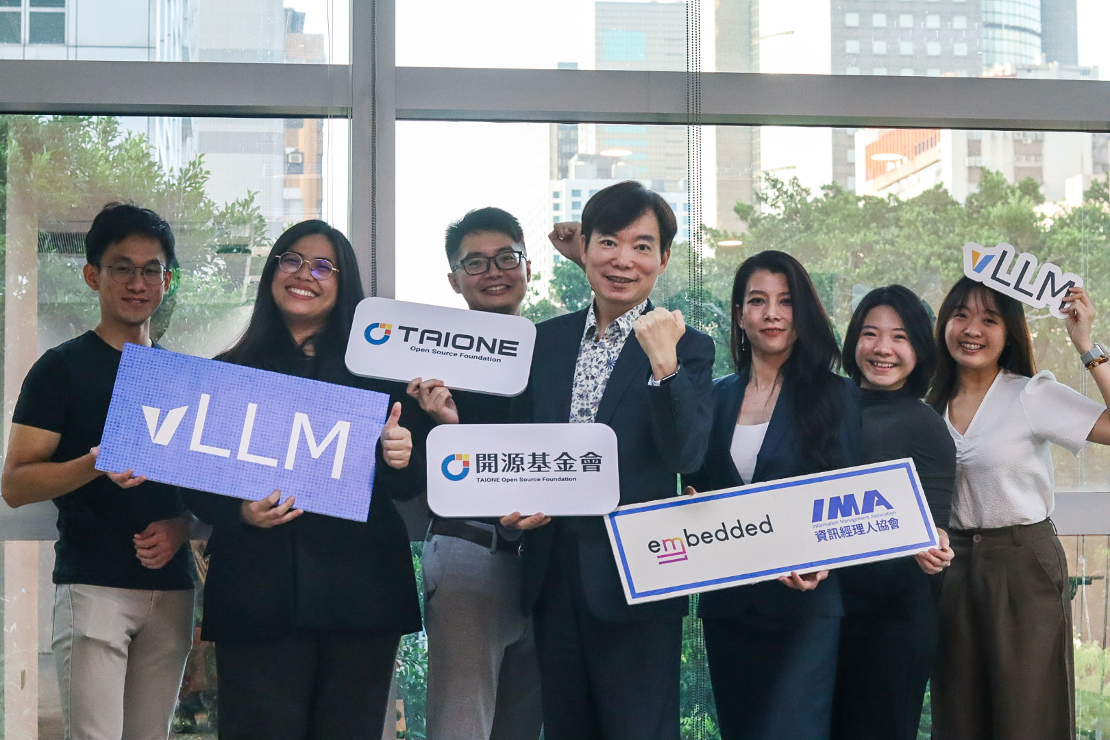 Members of the Embedded LLM team pictured with Rock Tsai, Chairman of the TAIONE Open Source Foundation.