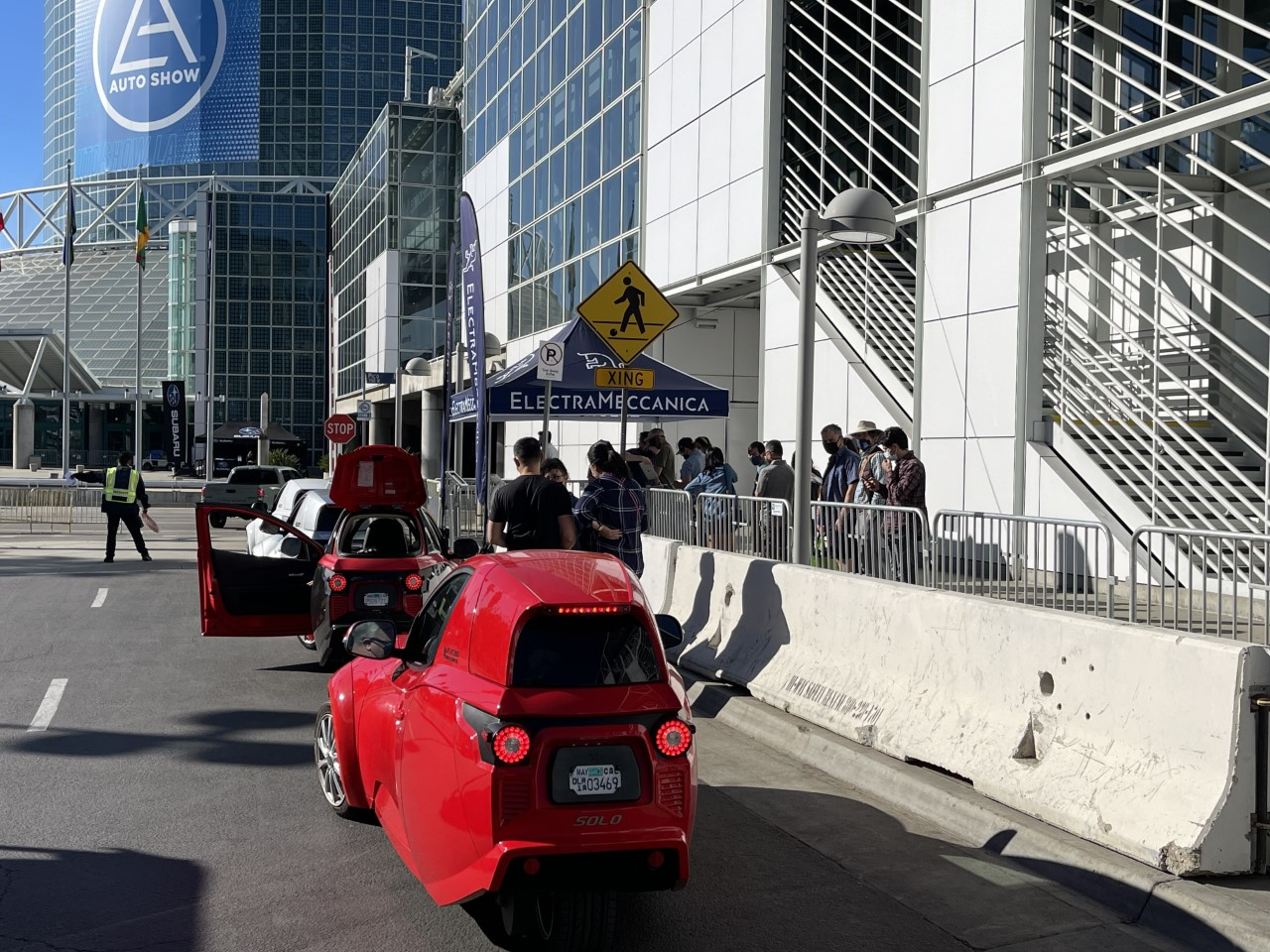 Consumers and industry participants test drive the SOLO EV at the Los Angeles Auto Show