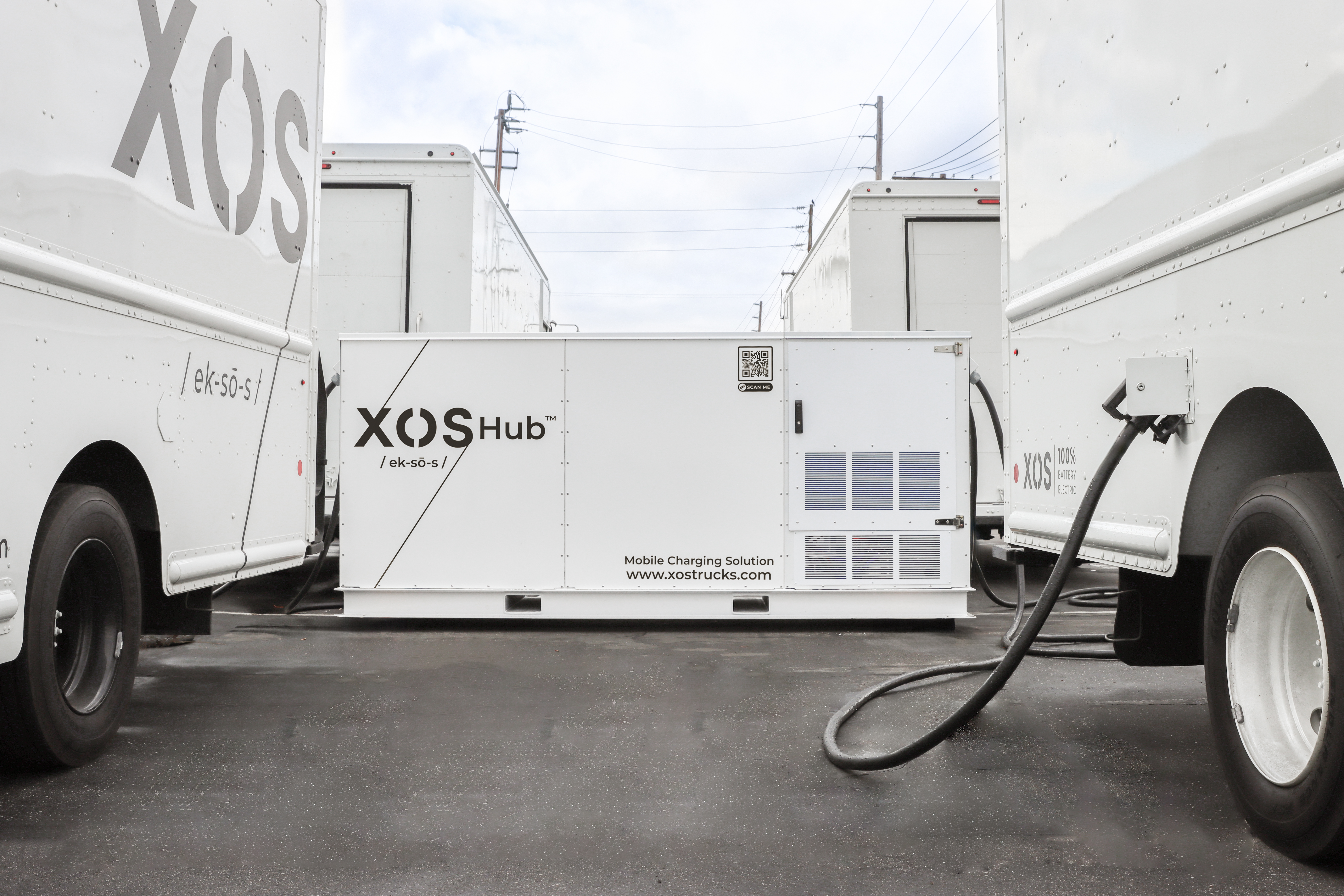 Xos Hub™ Charging Four Xos Stepvans