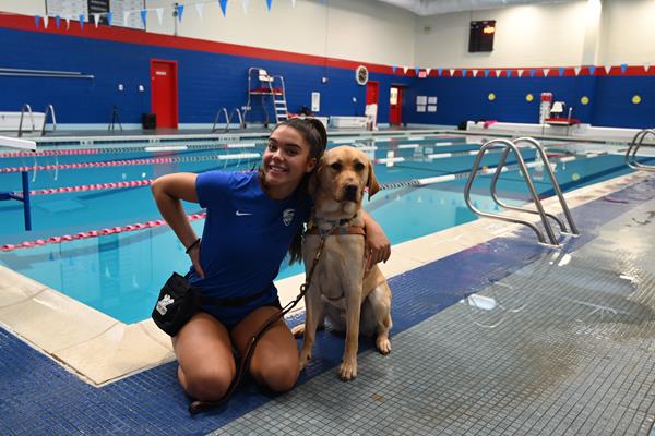 Team USA Paralympian Swimmer Anastasia Pagonis and her guide dog 'Radar' at swim practice
