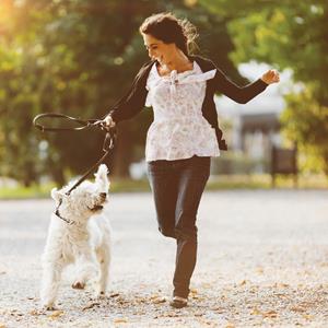 Woman walking her Dog