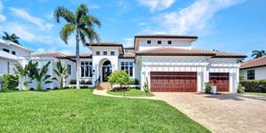 Elite Auctions Presents Elegantly Designed, Private Oasis at 445 Putter Point Drive, Naples, FL at Auction on June 10