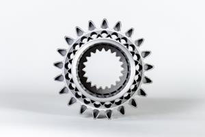 Redesigned and additively produced aerospace pinion, from BTM Aerospace and Carpenter Technology